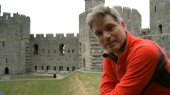 Jonathan Foyle at Caernarvon Castle in 'Climbing Great Buildings'