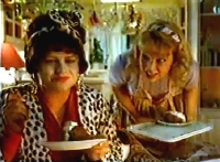 Sara Crowe & Ann Bryson in one of their famous commercials for Philadelphia cheese